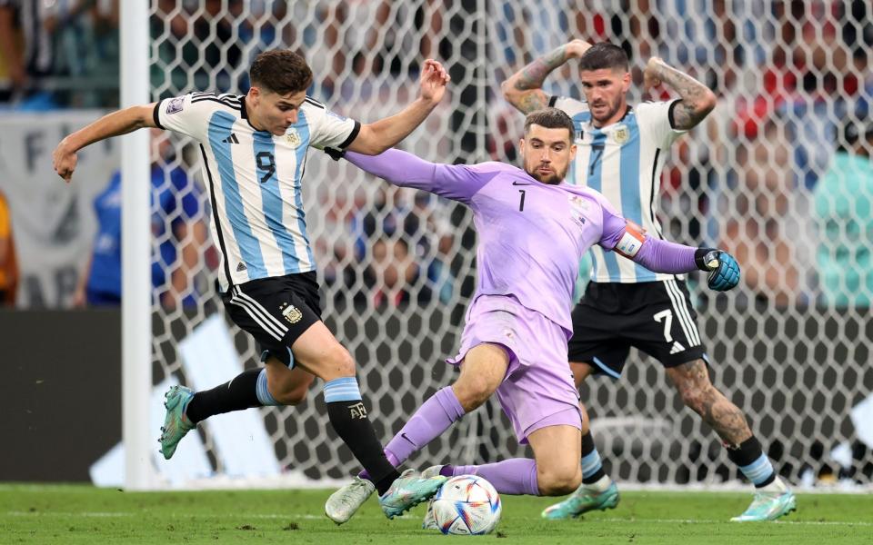 Julian Alvarez of Argentina scores the team's second goal past Mathew Ryan of Australia during the FIFA World Cup Qatar 2022 Round of 16 match between Argentina and Australia at Ahmad Bin Ali Stadium - Getty Images