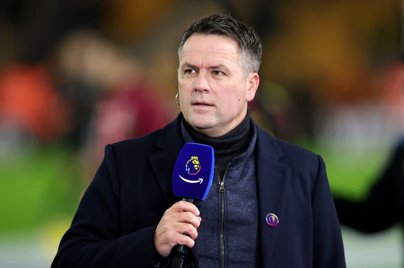 TV pundit and former footballer, Michael Owen looks on as he speaks prior to the Premier League match between Wolverhampton Wanderers and Burnley FC at Molineux on December 05, 2023 in Wolverhampton, England