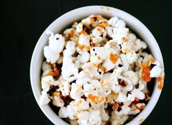 <strong>Get the <a href="http://www.thecurvycarrot.com/2012/05/23/sriracha-ranch-popcorn/" target="_hplink">Sriracha Ranch Popcorn recipe</a></strong>    Once you get hooked on Sriracha, it's hard to resist putting it on everything. And so popcorn just makes sense.