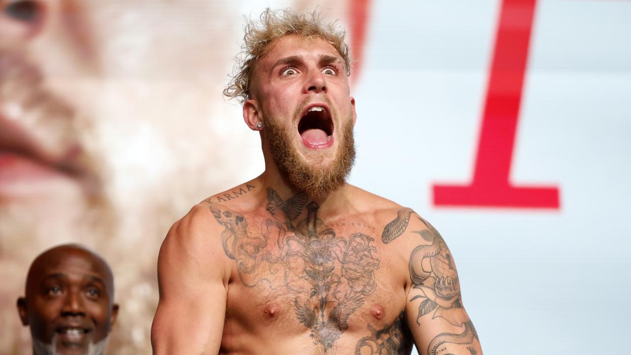  YouTube boxer Jake Paul flexes and roars ahead of his bout with Nate Diaz.  