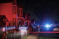 Chicago police work the scene of a shooting early Tuesday, April 6, 2021 in Chicago. Police say seven people were shot and wounded in a Chicago neighborhood overnight in the city’s latest wave of gun violence. Chicago police say the seven were involved in a fight on the sidewalk when shots were fired late Monday in the Englewood neighborhood on Chicago’s South Side. (Armando L. Sanchez/Chicago Tribune via AP)