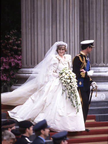 At her wedding to Prince Charles, 1981. The world cheered as the princess made her formal entrée into the public eye. (Photo by: Anwar Hussein/Getty Image)