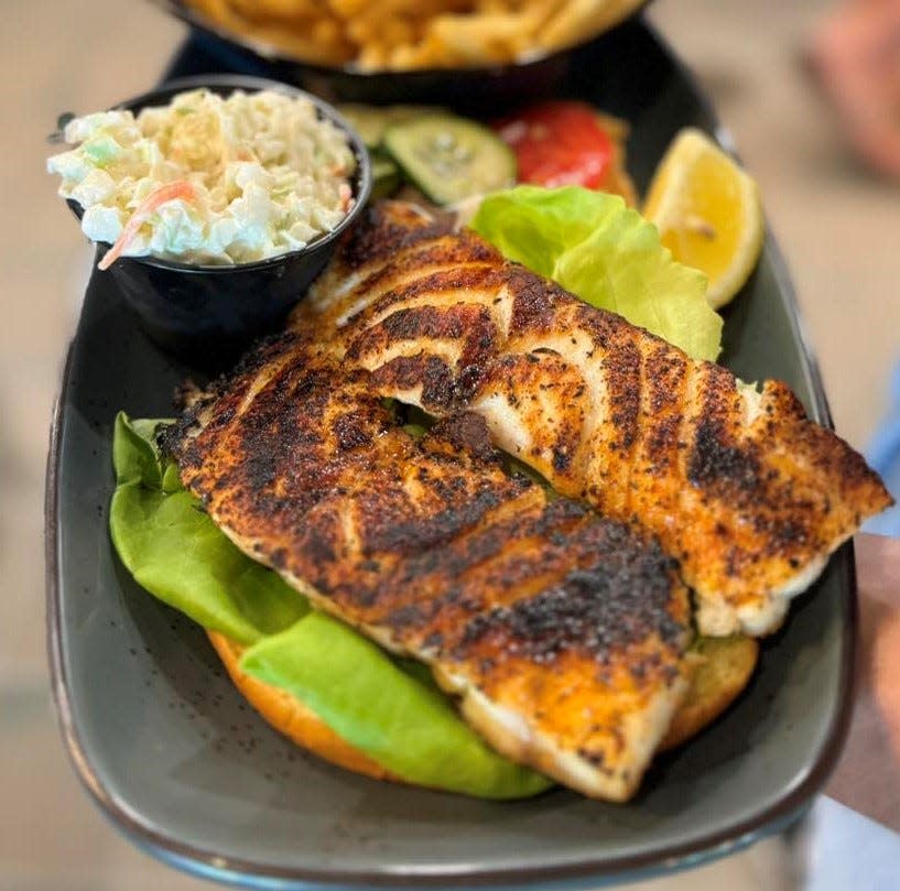 The Boathouse's menu includes the "Just Caught Sandwich," featuring fresh grilled, blackened or fried fish.