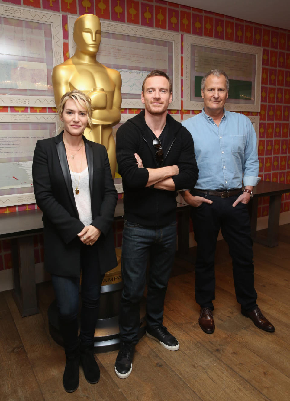 Kate Winslet appears alongside “Steve Jobs” costars Michael Fassbender and Jeff Daniels at a film screening.