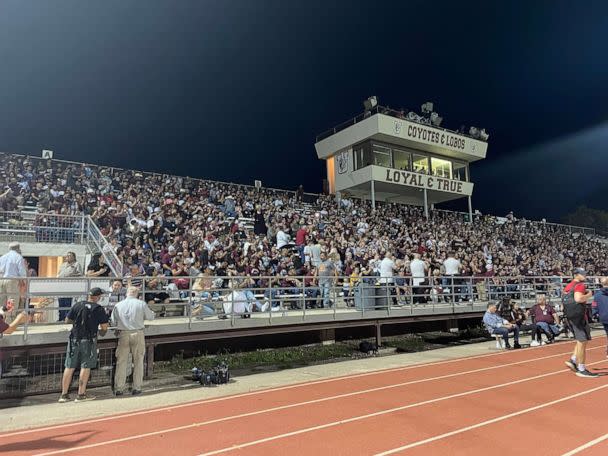PHOTO: Fans gather to watch Uvalde High School football team play in their first home game, Sept. 2, 2022. (Emily Shapiro/ABC News)