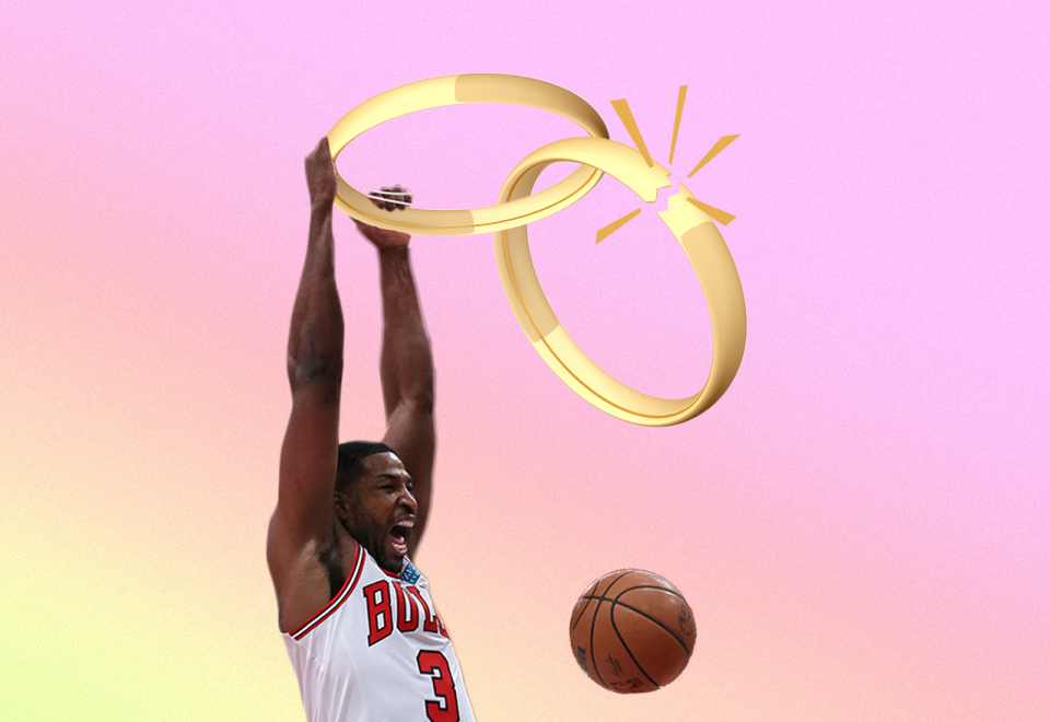 A man dunks a basketball through two linked wedding rings