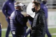 Boston College head coach Jeff Hafley, right, greets Notre Dame head coach Brian Kelly following an NCAA college football game, Saturday, Nov. 14, 2020, in Boston. (AP Photo/Michael Dwyer)