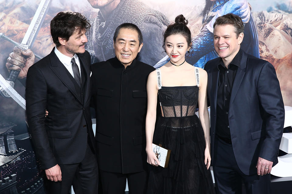 HOLLYWOOD, CA - FEBRUARY 15:  Actor Pedro Pascal, director Zhang Yimou, and actors Jing Tian and Matt Damon attend the premiere of Universal Pictures' 