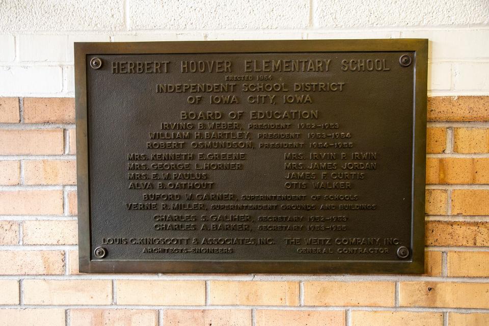 A placard with information about the former Hoover Elementary School building is seen, Friday, Feb. 11, 2022, at 2200 E. Court St. in Iowa City, Iowa. The building is used by the district for some classes with City High students and houses its ICCSD Online Program.