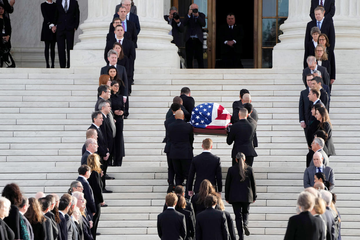 Supreme Court Justice Sandra Day O'Connor's flag-draped casket is carried up the steps of the Supreme Court  (Mark Schiefelbein / AP)