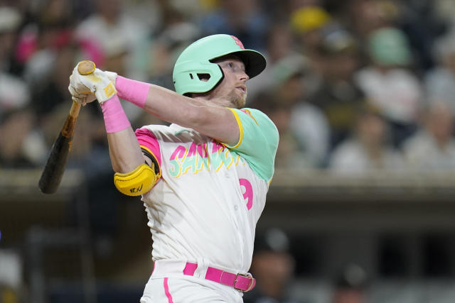 San Diego Padres' Jake Cronenworth follows through on a swing