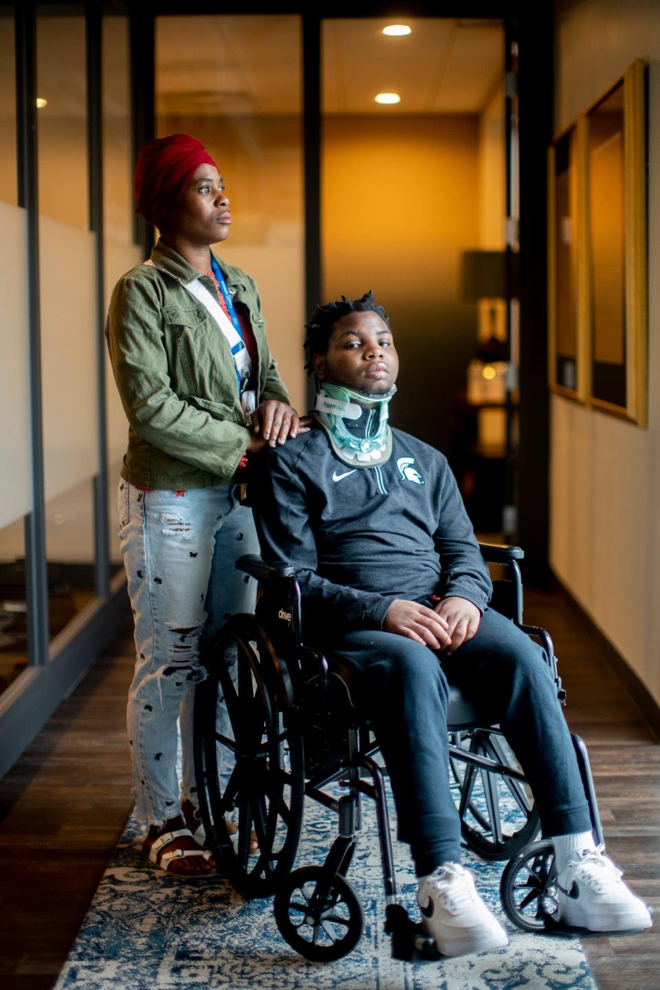 Mary S. Washington stands Monday beside her son, 15-year-old Damarion Allen, who is paralyzed from the chest down as a result of a fight May 7 inside the Franklin County Juvenile Intervention Center. A guard failed to keep Damarion, who was supposed to be in isolation, separated from another teen with whom he had a history of trouble and the two got into a brief altercation during which Allen' sustained a broken neck and spinal damage. A supervisor then instructed guards to drag Allen by the arms to his cell because she did not believe him when he said he could not feel his legs, video and records show.