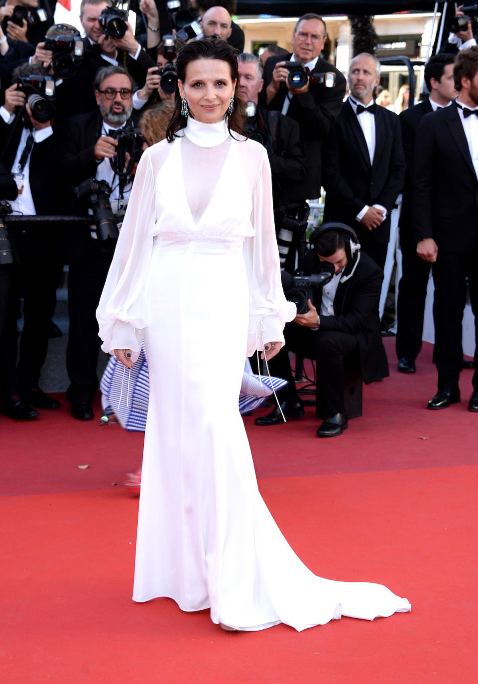 <p>The conservative cut of Juliette Binoche’s custom Chloé gown was made all the more sexy with subtle sheer fabric. (Photo: Anthony Harvey/FilmMagic) </p>