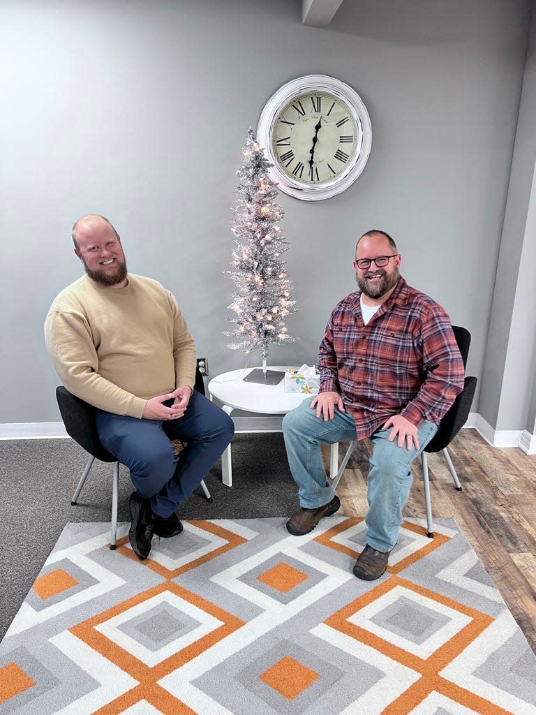 Local event organizers Justin Andert, left, and Jeremy Andrews have sparked dialogue amongst downtown business owners in what they've dubbed the 