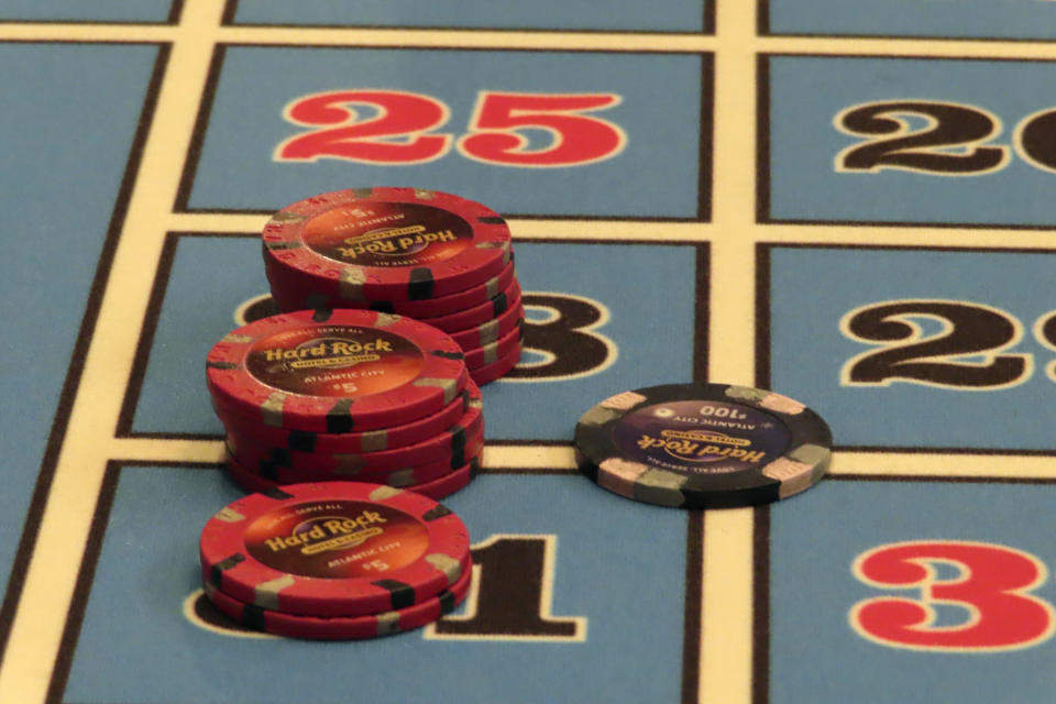 Chips sit on a roulette table at the Hard Rock casino in Atlantic City N.J. on May 17, 2023. On Jan, 16, 2023, New Jersey gambling regulators released statistics showing that Atlantic City's casinos, racetracks that accept sports betting and their online partners won nearly $5.8 billion from gamblers in 2023, a new record. But only three of the nine casinos won more from in-person gamblers last year than they did in 2019 before the coronavirus pandemic broke out. (AP Photo/Wayne Parry)