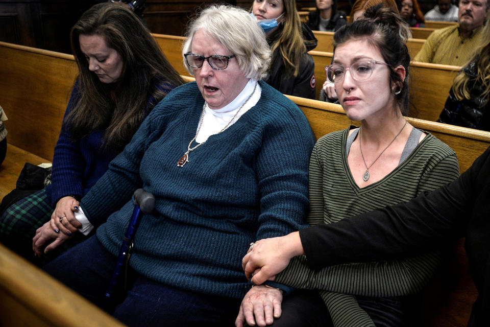 Image: From left, Kariann Swart, Joseph Rosenbaum's fiancee, Susan Hughes, Anthony Huber's great-aunt, and Hannah Gittings, Anthony Huber's girlfriend, listen to the verdict during Kyle Rittenhouse's trial at the Kenosha County Courthouse in Kenosha, Wisc., on Nov. 19, 2021. (Sean Krajacic / Pool via Reuters)