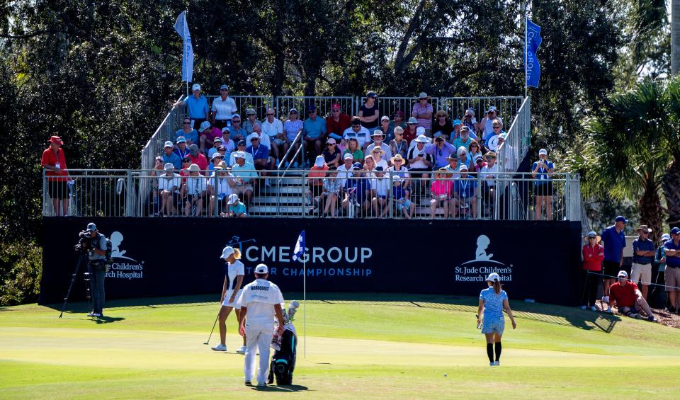 Stands are full with people watching on the 8th green during the final round of the CME Group Tour Championship at the Tiburon Golf Club in Naples, Fla., on Sunday, November 19, 2023.