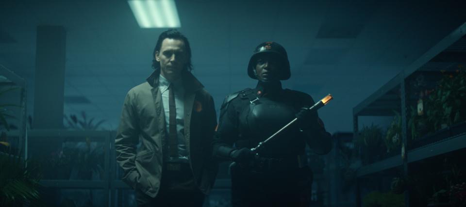 Tom Hiddleston as Loki and Wunmi Mosaku as Hunter B-15 in "Loki."