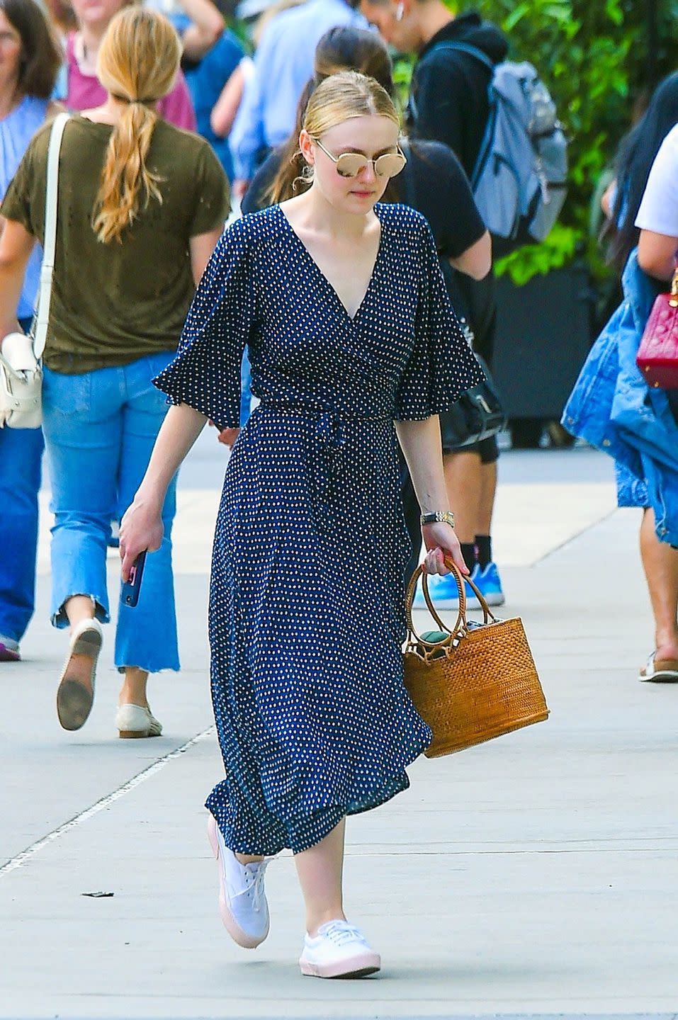 <p><strong>Who:</strong> Dakota Fanning</p><p><strong>Affordable Fashion Find: B Collection by Bobeau</strong> wrap dress, $98, <a rel="nofollow noopener" href="https://www.bobeau.com/product/orna+wrap+dress.do" target="_blank" data-ylk="slk:bobeau.com;elm:context_link;itc:0;sec:content-canvas" class="link ">bobeau.com</a>.</p><p><a rel="nofollow noopener" href="https://www.bobeau.com/product/orna+wrap+dress.do" target="_blank" data-ylk="slk:SHOP NOW;elm:context_link;itc:0;sec:content-canvas" class="link ">SHOP NOW</a><br></p><p><strong>Why We Love It: </strong>From work to the weekend, Fanning's polka dot wrap dress makes for the perfect everyday summer look at just under $100. </p>