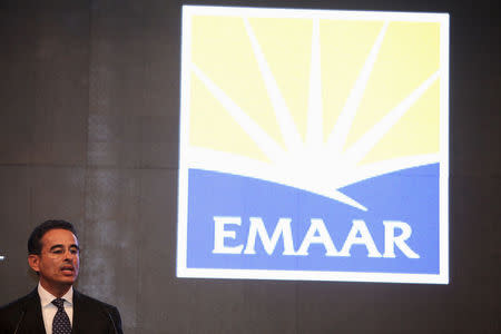 FILE PHOTO: Mohamed Alabbar, chairman of Emaar Properties PJSC, speaks during the opening of the "Erbil Downtown" project in Arbil, the capital of Iraq's autonomous Kurdistan region, October 27, 2013. REUTERS/Azad Lashkari/File Photo.