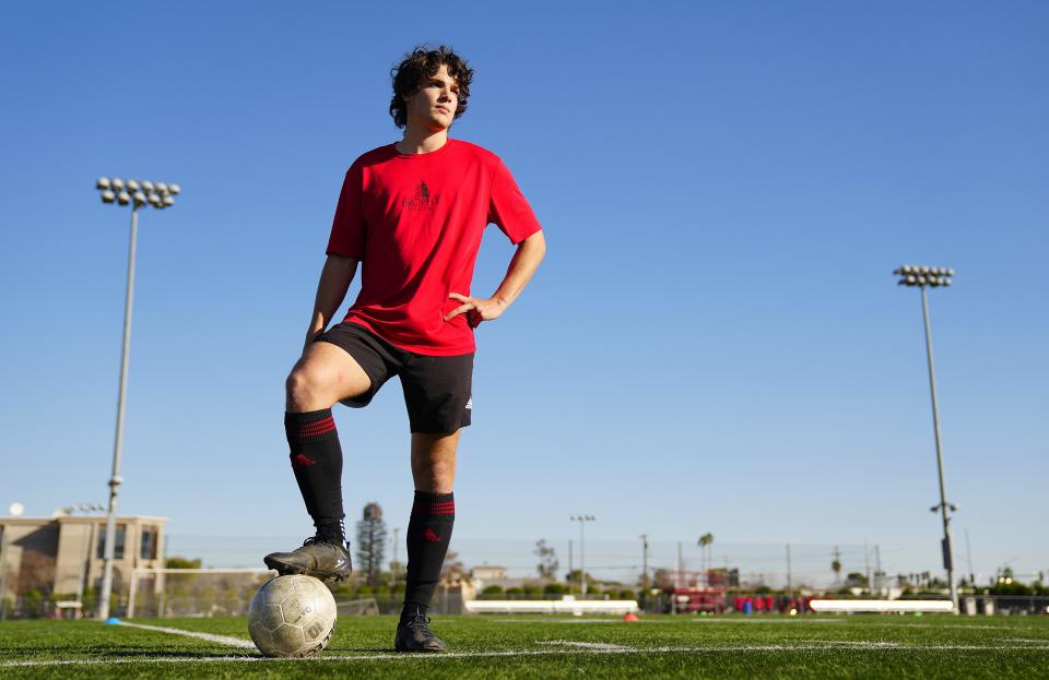 Brophy senior striker Matthew White poses for pictures during soccer practice in Phoenix on Jan. 19, 2023.