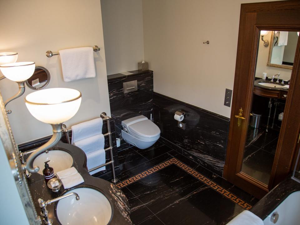 The bathroom in the author's room at Hotel Les Trois Rois.