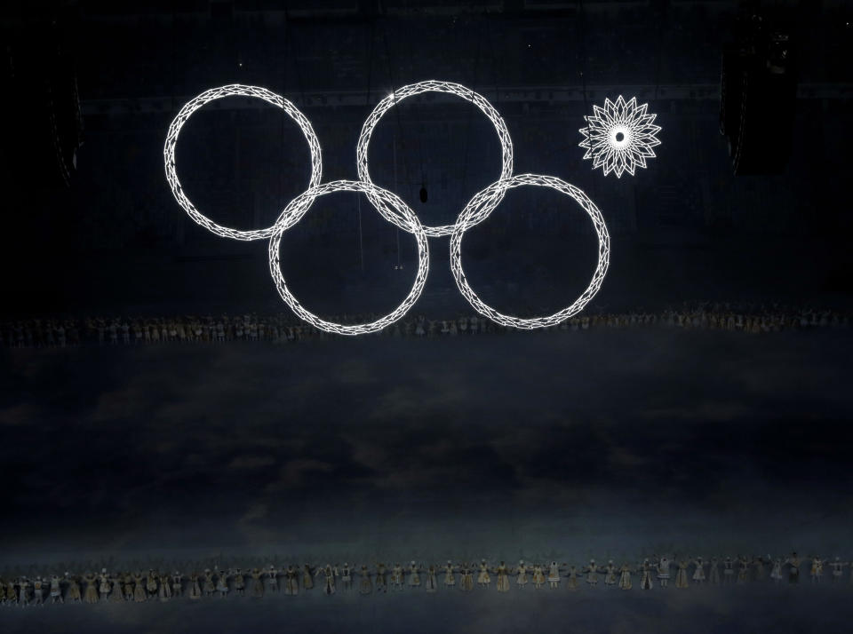 One of the Olympic rings fails to open during the opening ceremony of the 2014 Winter Olympics in Sochi, Russia, Friday, Feb. 7, 2014. (AP Photo/David J. Phillip )