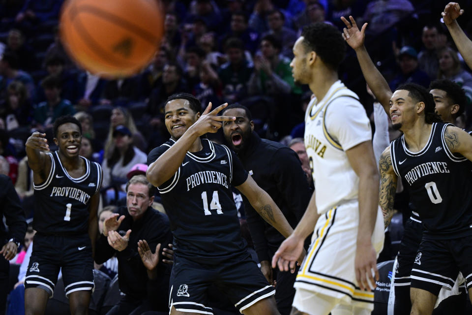 Providence's Corey Floyd Jr. (14) reacts after scoring a three-point basket during the second half of an NCAA college basketball game against Villanova, Sunday, Jan. 29, 2023, in Philadelphia. (AP Photo/Derik Hamilton)