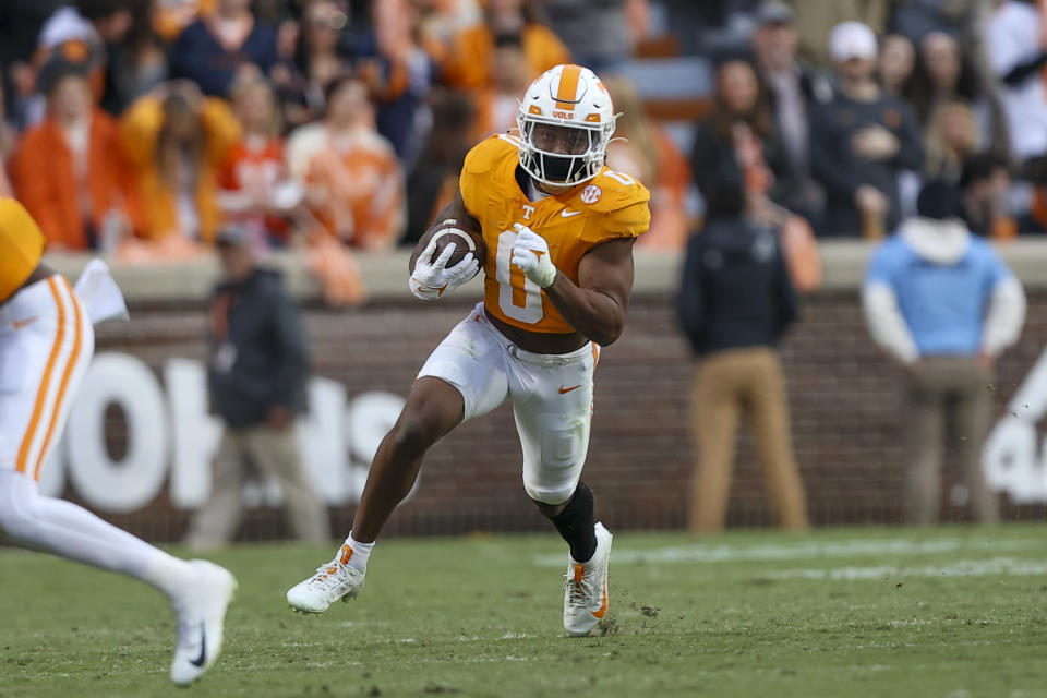 Nov 25, 2023; Knoxville, Tennessee, USA; Tennessee Volunteers running back Jaylen Wright (0) runs the ball against the Vanderbilt Commodores during the first half at Neyland Stadium. Mandatory Credit: Randy Sartin-USA TODAY Sports