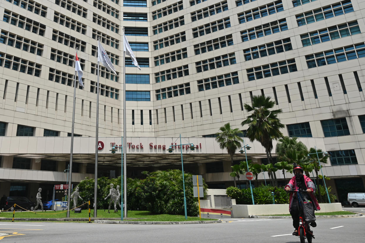 The exterior of Tan Tock Seng Hospital is pictured in Singapore on April 30, 2021, as authorities sought to contain the spread of the Covid-19 coronavirus after a cluster of cases were detected at the facility. (Photo by ROSLAN RAHMAN / AFP) (Photo by ROSLAN RAHMAN/AFP via Getty Images)