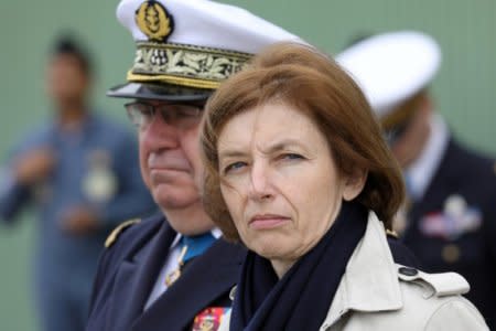 FILE PHOTO: French Minister of the Armed Forces Florence Parly (R) and French President personal chief of military staff, admiral Bernard Rogel (L) attend a ceremony marking the 40th anniversary  of the mid ranking Air Force officers' school,