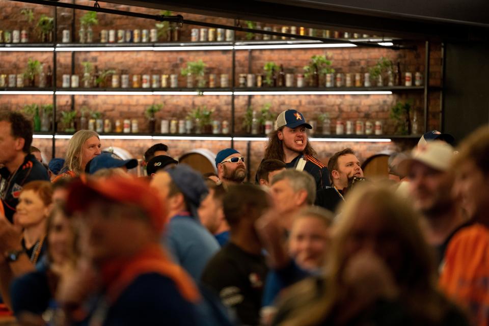 A FC Cincinnati fan reacts to a penalty being called in the NY Red Bulls goal box leading to a game tying penalty kick at the FC Cincinnati and New York Red Bulls MLS playoff match watch party inside TQL Stadium in Cincinnati on Saturday, Oct. 15, 2022. 