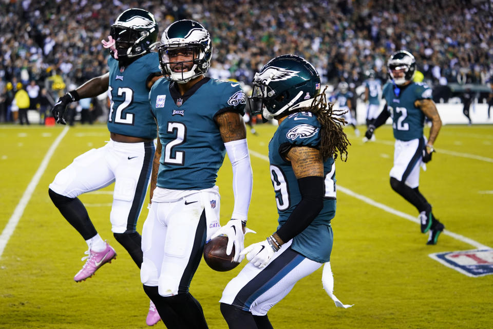 Philadelphia Eagles' Darius Slay celebrates his interception of a pass intended for Dallas Cowboys' Michael Gallup during the first half of an NFL football game Sunday, Oct. 16, 2022, in Philadelphia. (AP Photo/Chris Szagola)
