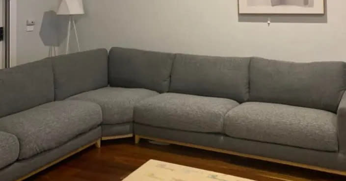 A mum transformed her Kmart couch with $19 blankets. 