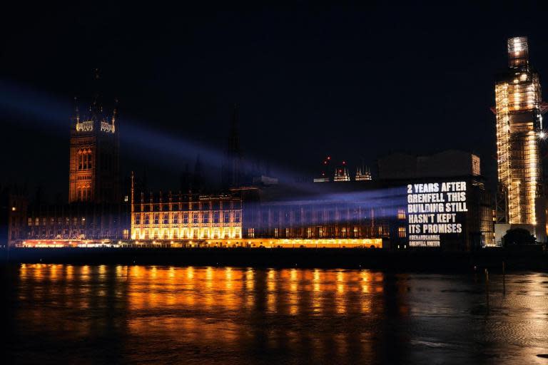 Survivors and bereaved families of the Grenfell Tower fire have projected a damning message on to the Houses of Parliament two years on from the devastating blaze.The Parliament building was illuminated with a message re-iterating survivors’ calls for the Government to take action on making high-rises across the UK safer.It follows a similar action last week, when messages were projected on to “unsafe” tower blocks across the UK on the eve of the second anniversary of the fire.The message beamed onto Parliament on Monday night read: “Two years after Grenfell, this building still hasn't kept its promises. Demand Change."Friday marked 24 months since a small kitchen fire in a flat on an estate in Kensington turned into the most deadly domestic blaze since the Second World War.Some 72 people were killed and scores of families were made homeless. The fire triggering both a public inquiry and a criminal investigation.Latest figures show some 328 high-rise residential and public buildings are still to complete the replacement of unsafe cladding amid fears over its contribution to the Grenfell Tower tragedy.A spokeswoman for campaign group Grenfell United, which organised the projections, said: "Last week we sent a powerful message across the UK that was hard to ignore. The reaction and outpouring of support has been incredible."We felt now was time to shine a spotlight on one more building - the Houses of Parliament."The spokeswoman added: "We are calling for all dangerous cladding to be replaced, for fire safety measures in all tower blocks and for a new separate housing regulator that would put people over profits."With a new prime minister about to be appointed, fulfilling the promises made by this Government after the fire must be made a priority. People must be safe in their homes."Messages were projected on high-rise blocks in London, Newcastle and Manchester in last week's action.A projection on west London's Frinstead House, a 20-storey block which lies on the same estate as Grenfell, claimed: "2 years after Grenfell this building still has no sprinklers demandchange."On Newcastle's Cruddas Park House, a 25-storey block designated to over-50s, a message read: "2 years after Grenfell and the fire doors in this building still don't work."And in Manchester, a projection on the 246-flat NV Building warned that "dangerous cladding" still wrapped the outside of the structure.