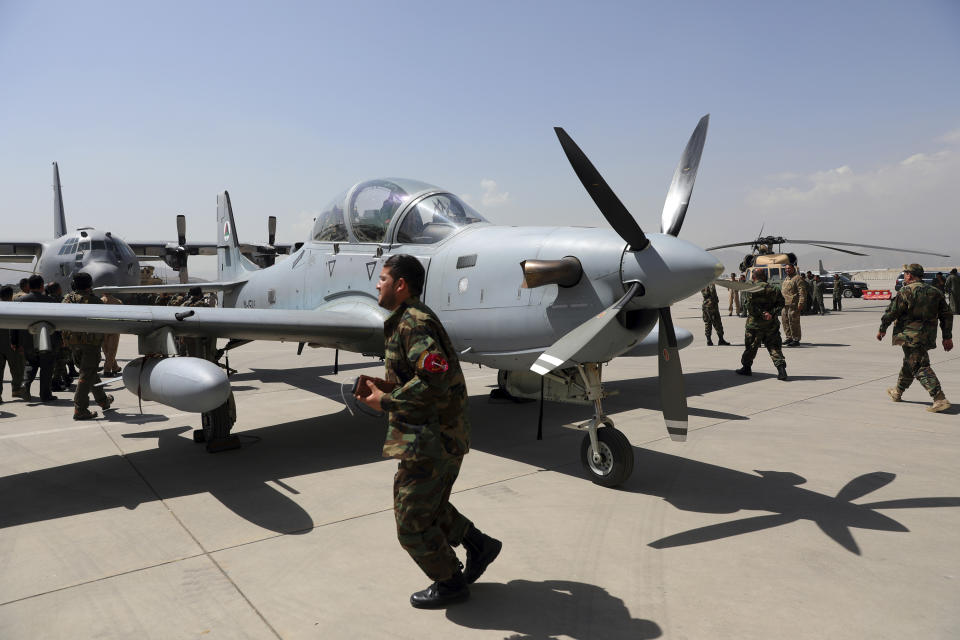 FILE - A-29 Super Tucano planes are on display during a handover from the NATO-led Resolute Support mission to the Afghan army at the military Airport in Kabul, Afghanistan, Sept. 17, 2020. A year-old report by Washington’s Afghanistan watchdog warned in early 2021, months before President Joe Biden announced the end to America’s longest war, the Afghan air force would collapse without critical U.S. aid, training and American maintenance. The report by the Special Inspector General for Afghanistan Reconstruction John Sopko was classified back when it was written and only declassified on Tuesday, Jan. 18, 2021. (AP Photo/Rahmat Gul, File)