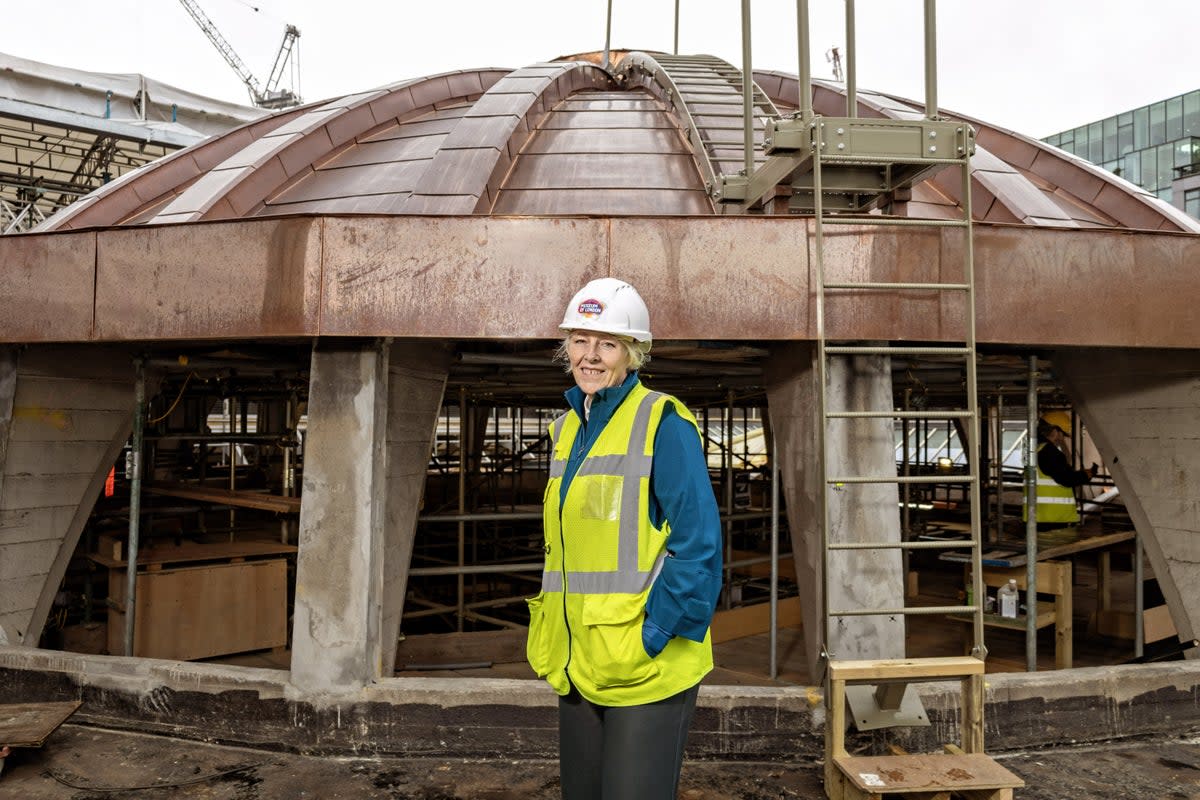 Museum of London director Sharon Ament in front of the restored copper roof in Smithfield Market  (Adrian Lourie)