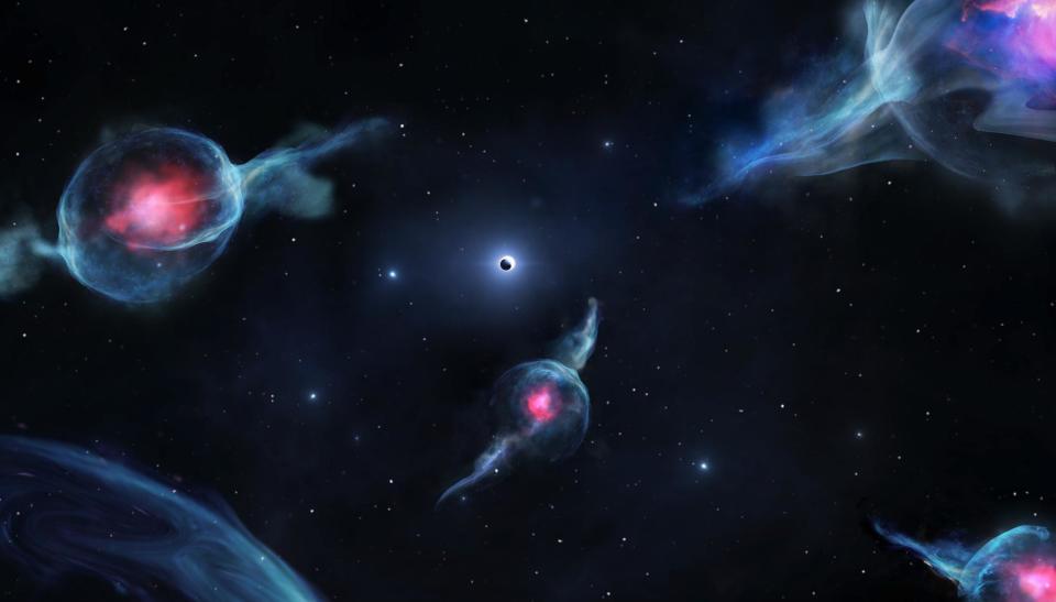 Artist's impression of G objects, with the reddish centers, orbiting the supermassive black hole at the center of our galaxy. The black hole is represented as a dark sphere inside a white ring (above the middle of the rendering): Jack Ciurlo