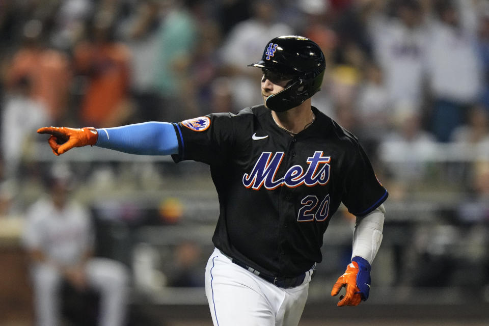 New York Mets' Pete Alonso gestures to teammates as he runs the bases on a three-run home run against the Washington Nationals during the fifth inning of a baseball game Friday, July 28, 2023, in New York. (AP Photo/Frank Franklin II)