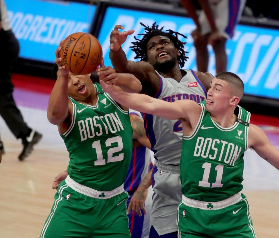 Isaiah Stewart fights for a rebound against the Celtics, Jan. 1, 2021.