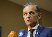 German Foreign Minister Heiko Maas, speaks to the media after a meeting on divisive migrant issue in Paris, France, July 22, 2109. European ministers are meeting in Paris in a new step to find an accord on the divisive issue of how to deal with migrants crossing the Mediterranean but, shut out by Italy and unwanted elsewhere, caught in political standoffs. (AP Photo/Michel Euler)