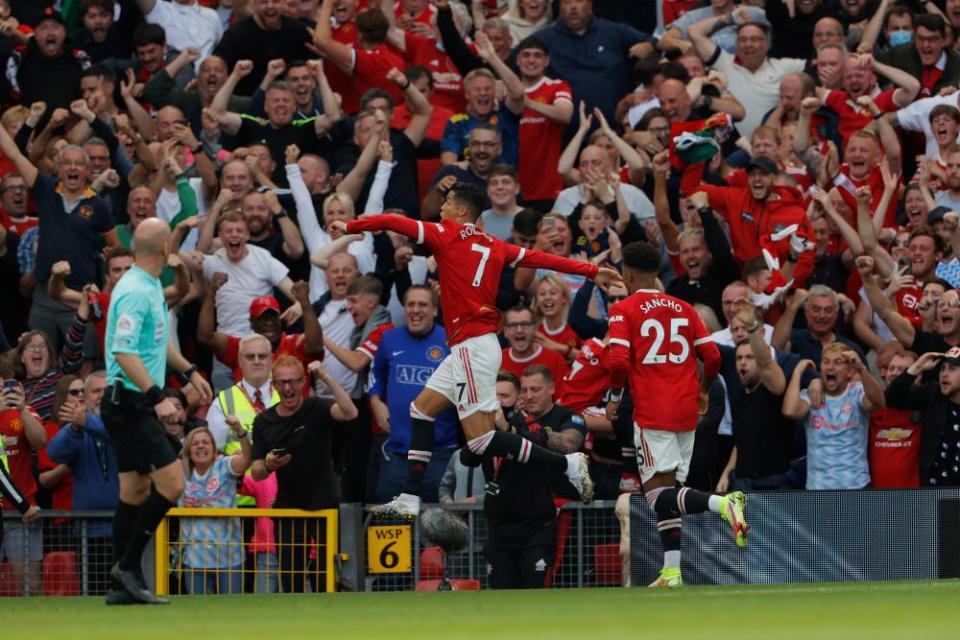 Fans celebrate after Cristiano Ronaldo scored his, and Manchester United’s second goal of the game.