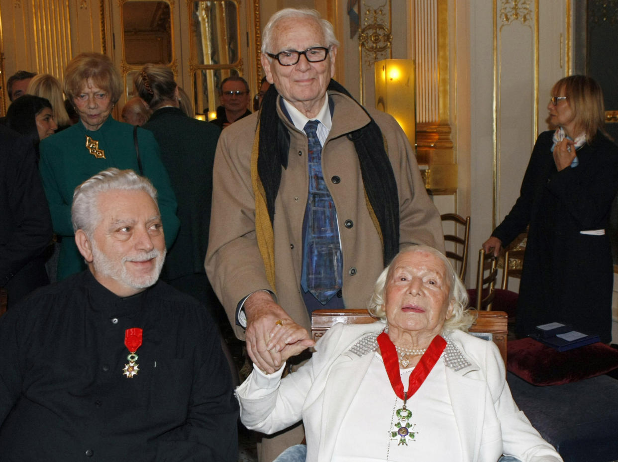 FILE - Fashion designers, Paco Rabanne, left, Pierre Cardin, center, and Marie-Louise Carven-Grog posing after being awarded the Legion of Honor by French Culture Minister Frederic Mitterrand in on April 16, 2010 Paris. Paco Rabanne, The Spanish-born pace-setting designer Paco Rabanne, known for perfumes sold worldwide and his metallic, space-age fashions, has died, the group that owns his fashion house announced on its website Friday Feb.3, 2023. He was 88. (AP Photo/Jacques Brinon, File)