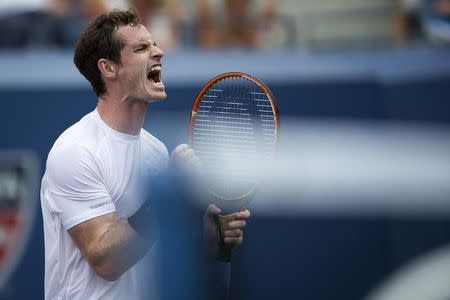 Andy Murray of Britain reacts after winning a point against Adrian Mannarino of France during their second round match at the U.S. Open Championships tennis tournament in New York, September 3, 2015. REUTERS/Carlo Allegri