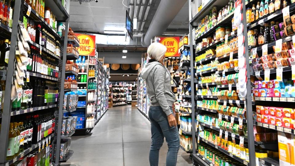 A woman shops in a Canberra supermarket.