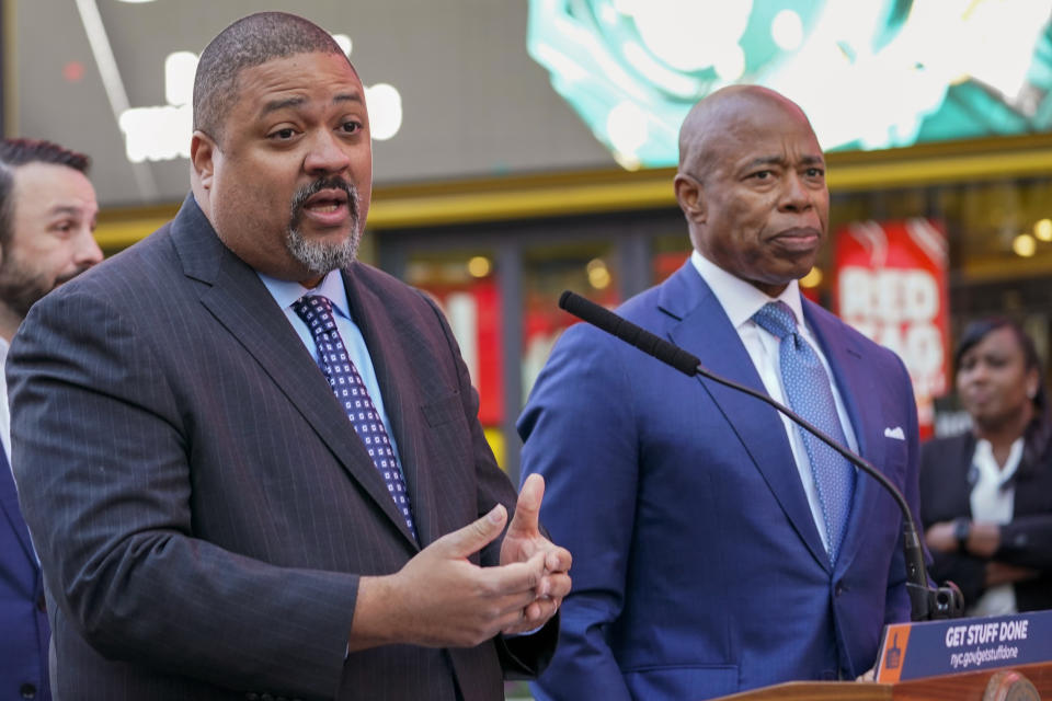 Manhattan District Attorney Alvin Bragg at the microphone, flanked by New York City Mayor Eric Adams. 