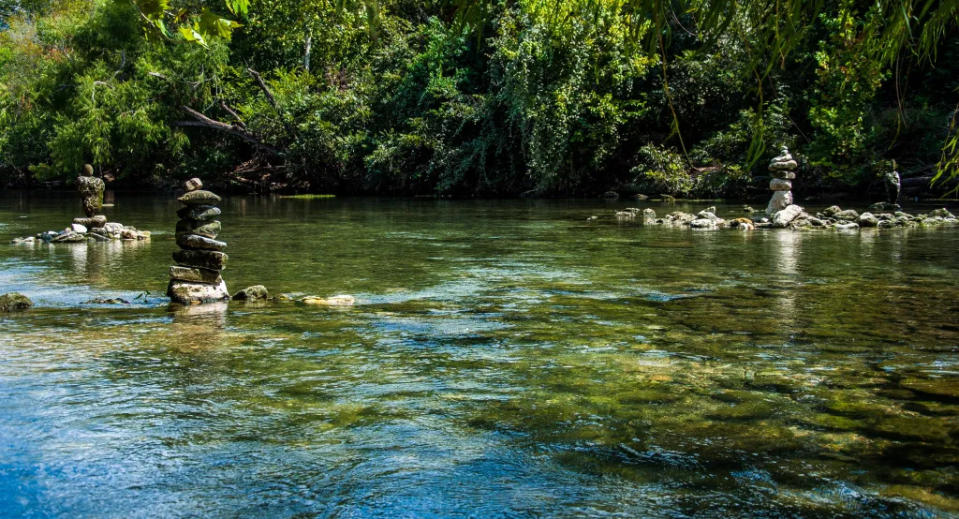 Rock Stacking at Barton Springs Pool Austin Texas via Getty Images