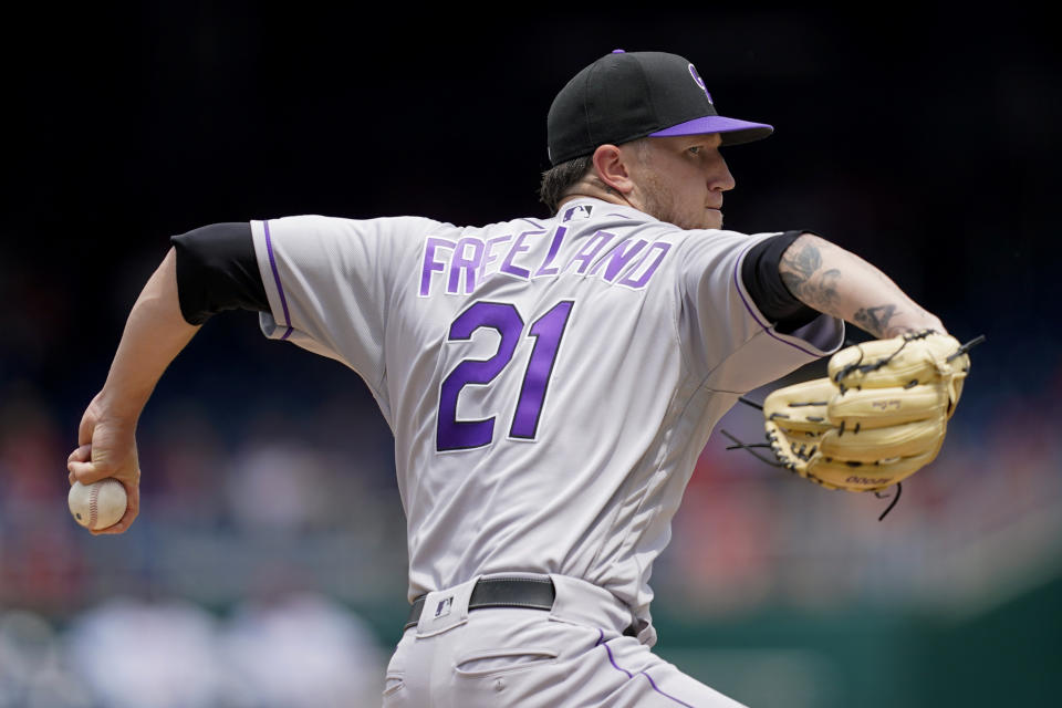 Colorado Rockies starting pitcher Kyle Freeland throws to the Washington Nationals in the first inning of a baseball game, Sunday, May 29, 2022, in Washington. (AP Photo/Patrick Semansky)