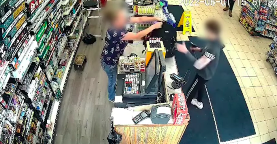 After the clerk filled the armed 12-year-old boy’s backpack with money from the till, she can be heard telling him to ‘get out!’ (Youtube/MLive)