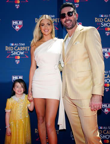 <p>Daniel Shirey/MLB Photos/Getty</p> Kate Upton and Justin Verlander with their daughter Genevieve Upton Verlander at the 2022 MLB All-Star Red Carpet Show.